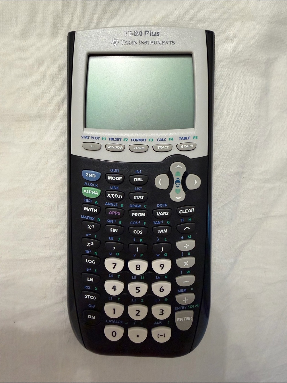 Texas Instruments Graphing Calculator in Black and Light Gray